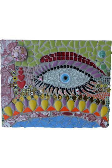 “Spirit Eye” mosaic blends cut glass tile and radiant color to create a powerful protective symbol that’s both mystical and modern inspired by ancient traditions that ward off evil and invite clarity