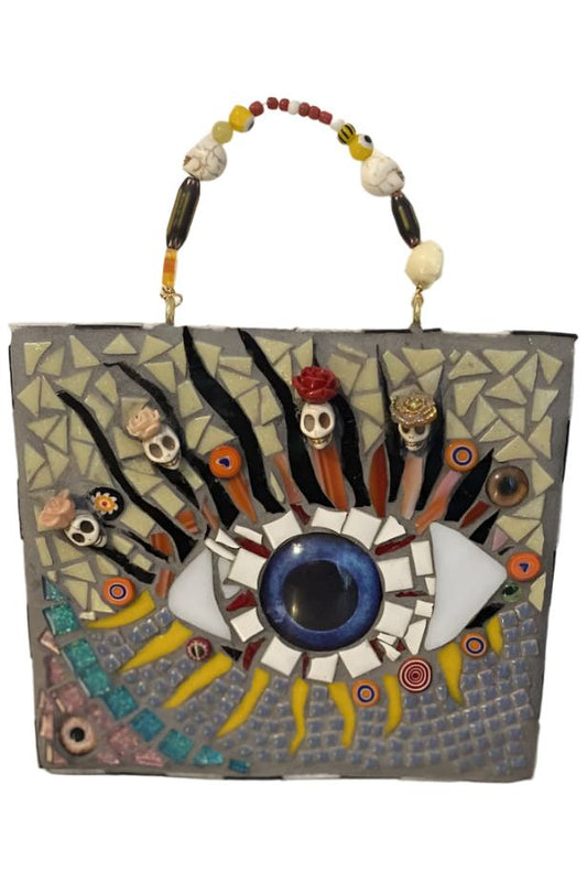 Mosaic Seeing Eye with cut glass and tile mixed media enhancements and a beaded handle for hanging to ward off evil spirits